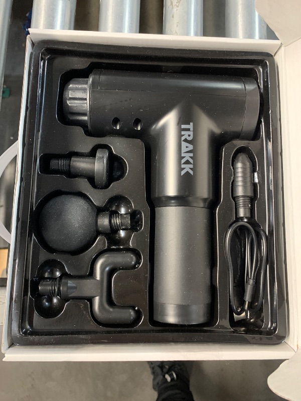 Photo 1 of ***** Non Functional********TRAKK Beast Deep Tissue Percussion Massage Gun, Rechargeable Handheld 6 Speed Cordless Massager, 4 Interchangeable Heads (Black)