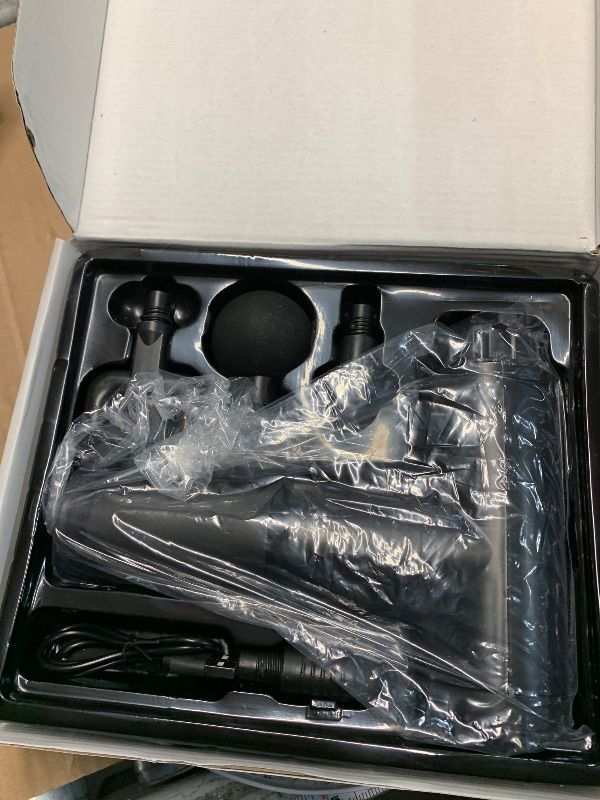 Photo 1 of ******Nonfunctional****** TRAKK Beast Deep Tissue Percussion Massage Gun, Rechargeable Handheld 6 Speed Cordless Massager, 4 Interchangeable Heads (Black)