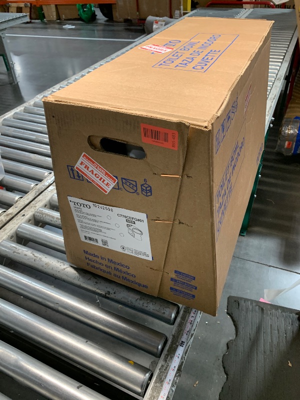 Photo 1 of ***FACTORY SEALED***
TOTO Drake Transitional Two-Piece Elongated 1.28 GPF Universal Height TORNADO FLUSH Toilet with CEFIONTECT, Cotton White - CST786CEFG#01