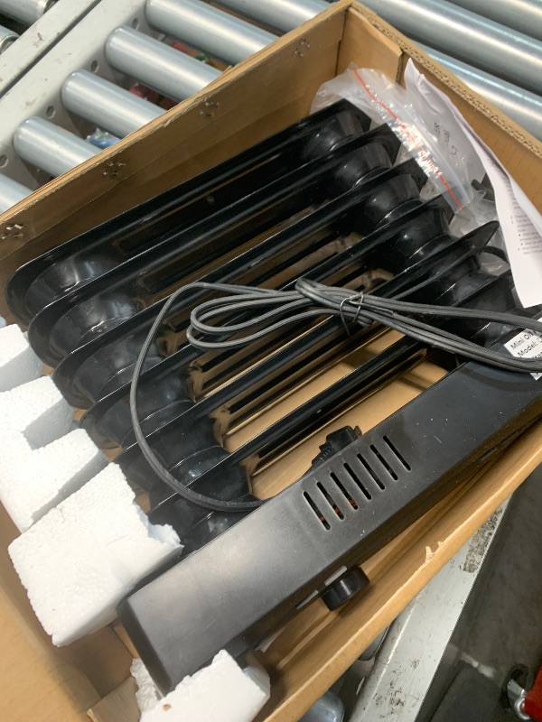 Photo 1 of (used)(missing base) JASUN Oil Filled Radiator Heater with Adjustable Thermostat, Mini Portable Space Heater 700W for Indoor Use, Overheat Safety, Quiet Work, Black