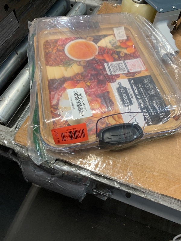 Photo 1 of ***(MINOR DAMAGE/ CHIPS CRACKS)***Farberware Build-A-Board Bamboo Cutting Board with Single Storage Compartment, Clear Locking Lid, Black Handles, Perfect for Charcuterie & Snacks