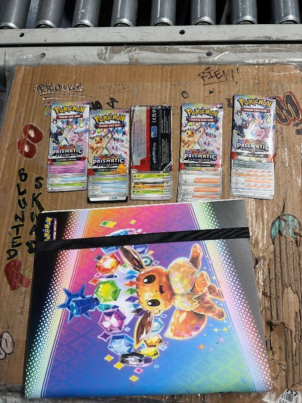 Photo 1 of ***ALL PACKS ARE OPEN AND COULD BE MISSING CARDS UNABLE TO VERIFY IF REAL***

Pokémon TCG Scarlet & Violet Prismatic Evolutions Binder Collection