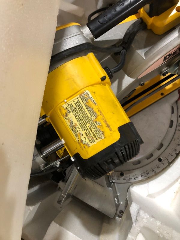 Photo 1 of ***MISSING PARTS***
DEWALT Miter Saw, 12 Inch Double Bevel Sliding Compound Miter Saw, Includes Blade Wrench and Clamp, Increased Crosscut Capacity, Powerful 3800 RPM Motor 15 Amp (DWS779)