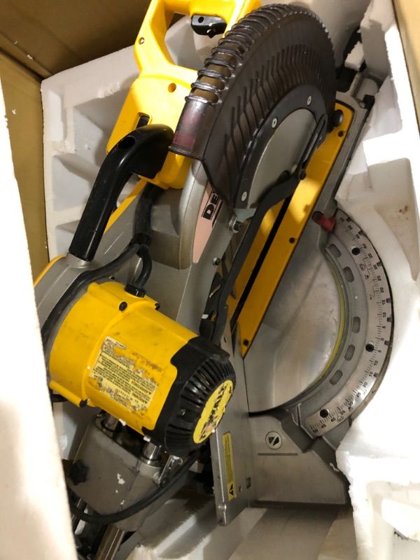 Photo 1 of ***MISSING PARTS***
DEWALT Miter Saw, 12 Inch Double Bevel Sliding Compound Miter Saw, Includes Blade Wrench and Clamp, Increased Crosscut Capacity, Powerful 3800 RPM Motor 15 Amp (DWS779)