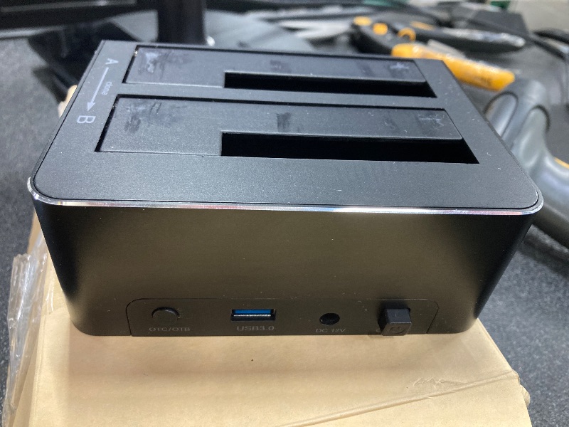 Photo 1 of ***(MISSING POWER CORD)*** Hard Drive Docking Station RSHTECH USB 3.0 Aluminum Dual Bay Hard Drive Dock for 2.5" & 3.5" SATA HDD SSD with SD/Micro SD Card Reader and Offline Clone/Duplicator Function Support 16TB Tool-Free