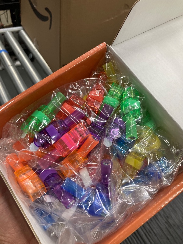 Photo 1 of 40 Pack Halloween Party Favors for Kids, LED Light Up Finger Lights Halloween Toys Bulk Glow in the Dark for School Classroo Goodie Bag Basket Stuffers Prizes Trick or Treats Gifts