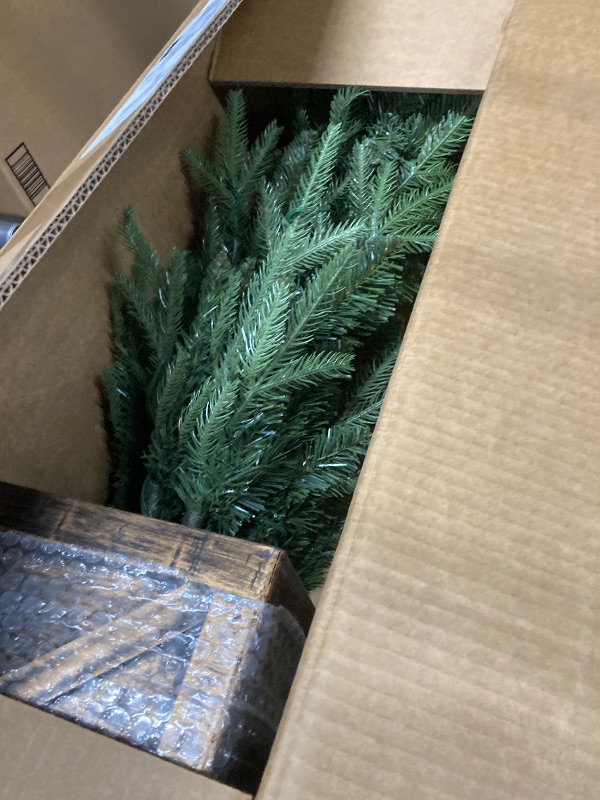 Photo 1 of **PLANTER IS DAMAGED ON ONE CORNER-SEE PIC***Nearly Natural 3ft. Finland Fir Artificial Christmas Tree in Decorative Planter with 272 Bendable Branches and 50 Warm White Lights