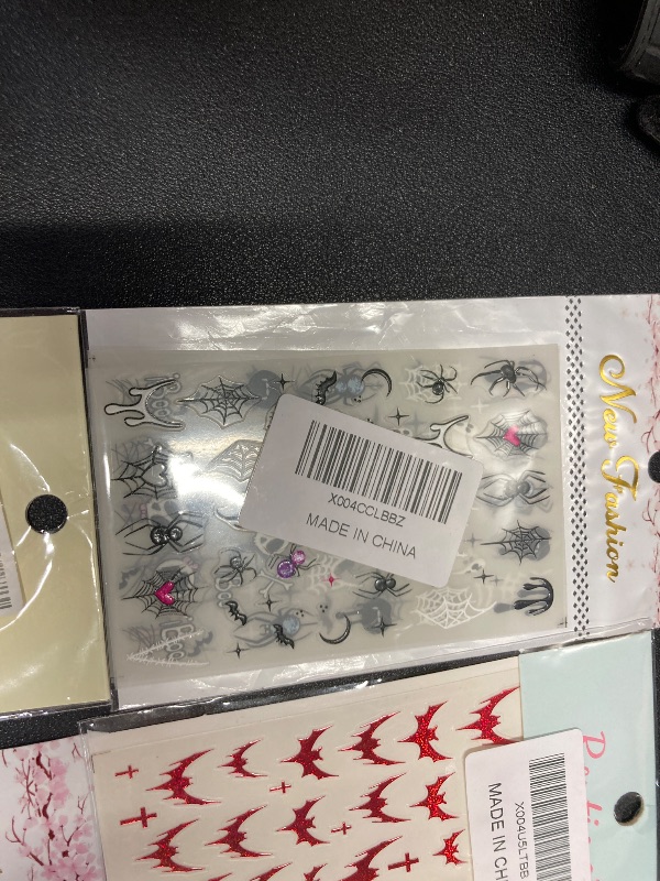 Photo 1 of ***7 PACKS INCLUDED***Halloween Nail Stickers Ghost Nail Decals 5 Sheets Self Adhesive Nail Art Stickers Ghosts Flower Skull Spider Nail Art Designs Halloween & VARIOUS OTHER Nail Supplies for Women Nail Art Decorations Accessories***7 PACKS INCLUDED***