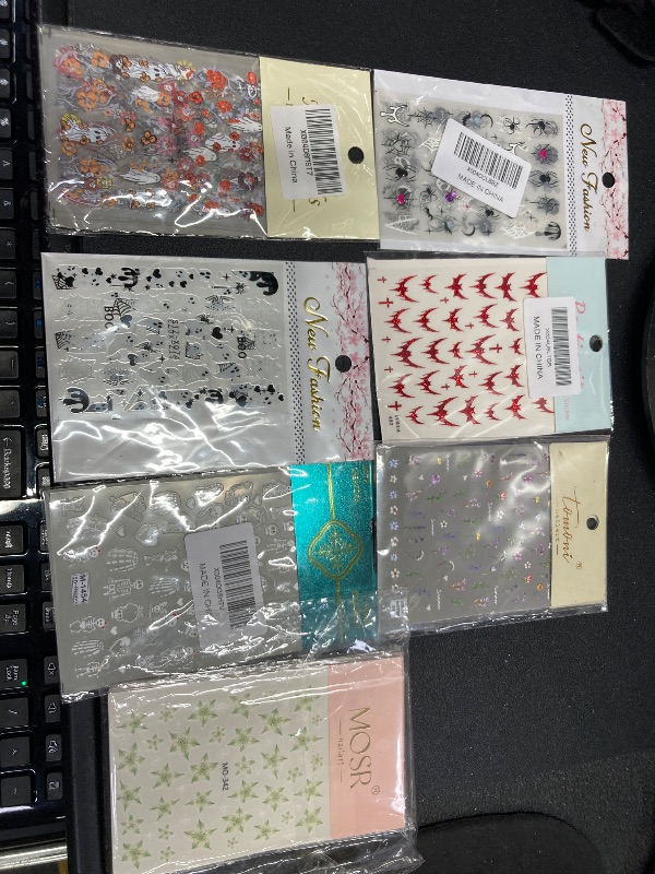 Photo 1 of ***7 PACKS INCLUDED***Halloween Nail Stickers Ghost Nail Decals 5 Sheets Self Adhesive Nail Art Stickers Ghosts Flower Skull Spider Nail Art Designs Halloween & VARIOUS OTHER Nail Supplies for Women Nail Art Decorations Accessories***7 PACKS INCLUDED***