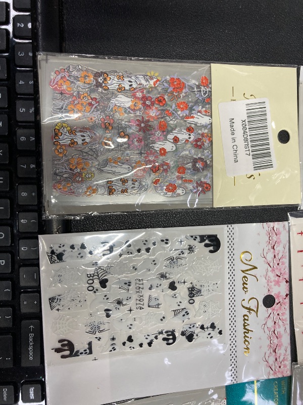 Photo 1 of ***7 PACKS INCLUDED***Halloween Nail Stickers Ghost Nail Decals 5 Sheets Self Adhesive Nail Art Stickers Ghosts Flower Skull Spider Nail Art Designs Halloween & VARIOUS OTHER Nail Supplies for Women Nail Art Decorations Accessories***7 PACKS INCLUDED***