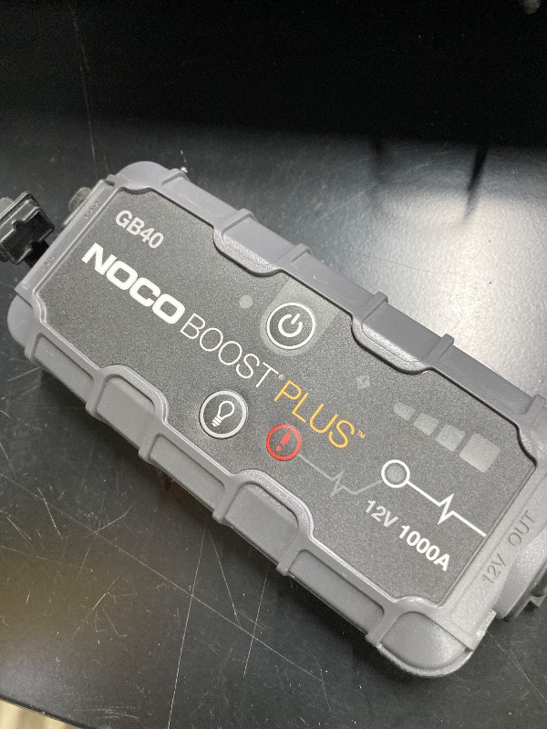 Photo 1 of ***(MISSING PARTS -SELLING AS IS ONLY)*** 
NOCO Boost GB40: 1000A UltraSafe Jump Starter – 12V Lithium Battery Booster Pack, Portable Jump Box, Power Bank - for 6.0L Gas and 3.0L Diesel Engines