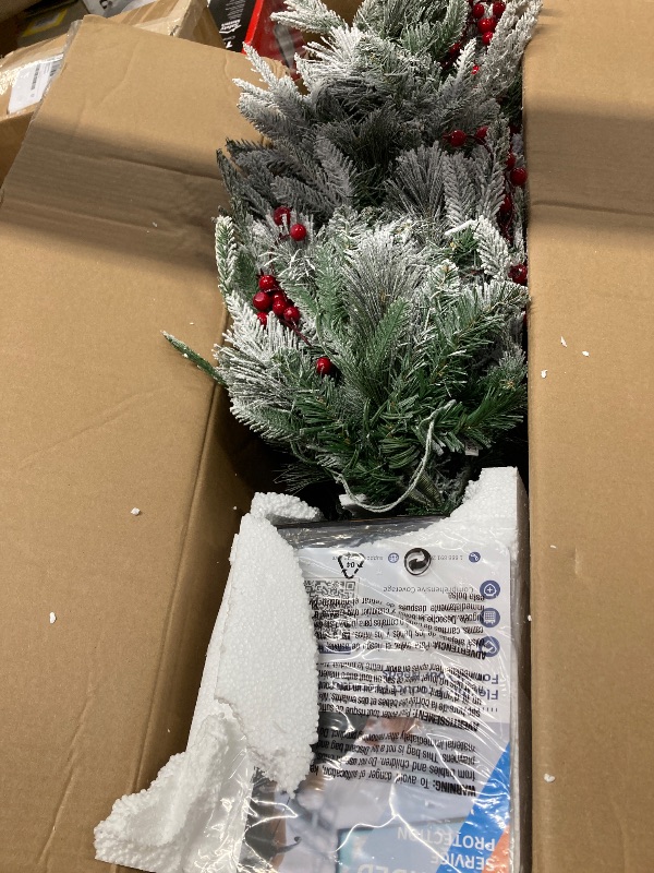 Photo 1 of .5 FT Prelit Premium Snow Flocked Artificial Christmas Tree with 8 Mode Warm White LED, Mini Prelit Xmas Pine Tree for Christmas Decoration,Yard,Home,Office,Outdoor,Indoor, Black Base- 1PC