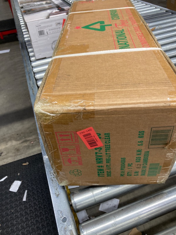 Photo 1 of ***Factory seal***
National Tree Company 6-ft. Pre-Lit North Valley Spruce Pencil Slim Artificial Christmas Tree, Green