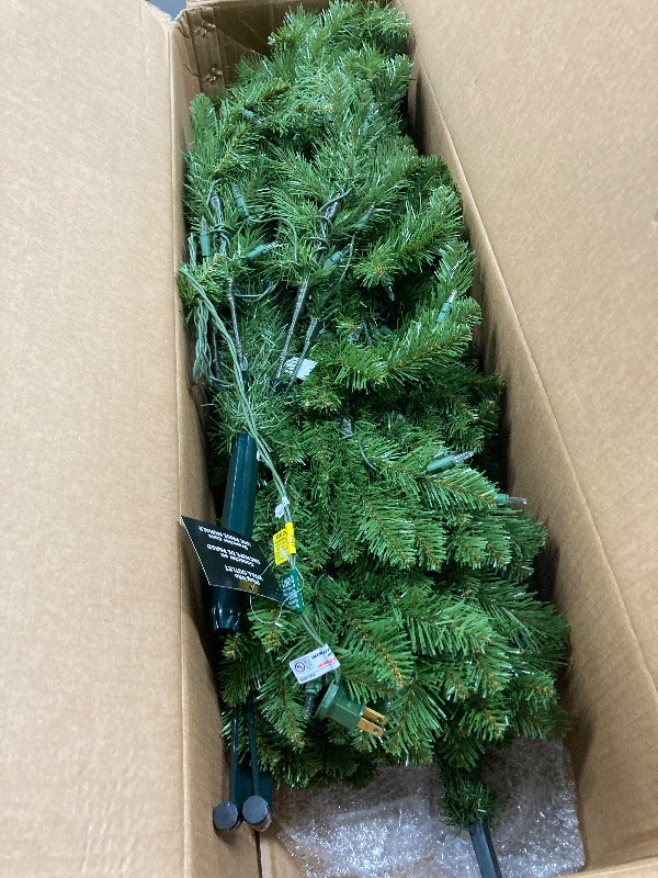 Photo 1 of ***tHE MODEL MAY VARY***  ***Factory seal***

National Tree Company 6.5 ft Unlit Dunhill Fir Full Artificial Christmas Tree, 1,838 Tips, Includes Stand, Green