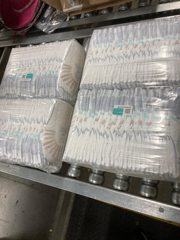 Photo 1 of ***(OPEN BOX -MISSING PIECES -SELLING AS IS) *** 
Pampers Pure Protection Baby Diapers, Size 3 (16-28 lbs), Up to 100% Leakproof, Premium Plant-Based Skin Protection, Hypoallergenic Soft Diapers