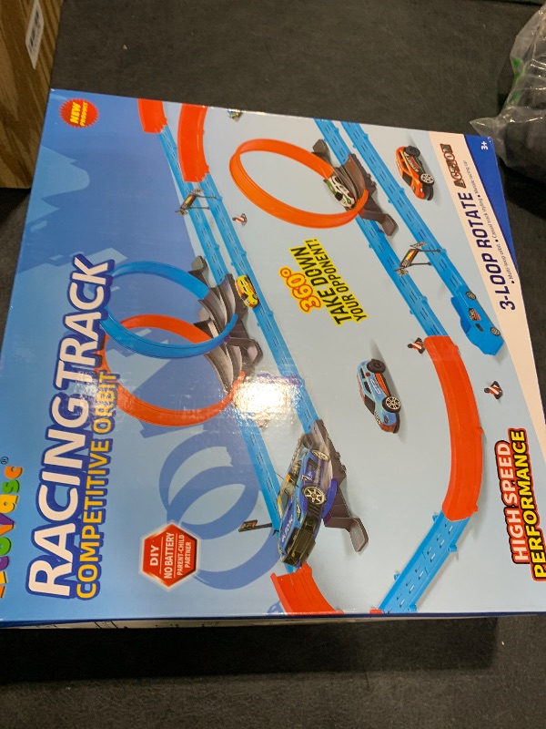 Photo 1 of ?Slot Car Race Track Sets with 360° Thrill Loops & 4 High-Speed Cars, 64 Pcs Large Flexible Racing Track for Kids Ages 3-5 4-8 8-12, Race Car Toys Gift for Boys Girls Birthday Christmas