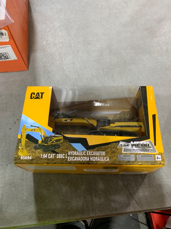 View 2 of 1:87 Caterpillar M323F Railroad Wheeled Excavator - Cat Yellow Version - (HO) High Line Series Model by Diecast Masters - 85656 - with Bucket, Ballast Tamper, and Rail Clamshell Bucket Attachments