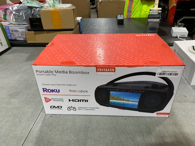 Photo 1 of Aiwa Portable DVD Player, Crystal Clear Sound with Dual 3W Speakers and Bass Function, Featuring a 7" LCD Display, Bluetooth Connectivity, FM Radio, CD/DVD Playback