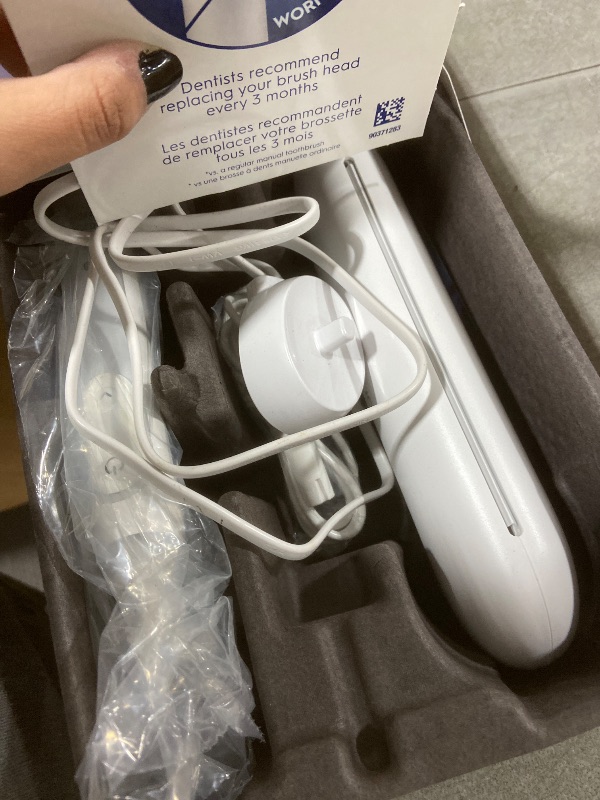 Photo 1 of Oral-B iO Series 9 Electric Toothbrush with 3 Replacement Brush Heads, White Alabaster