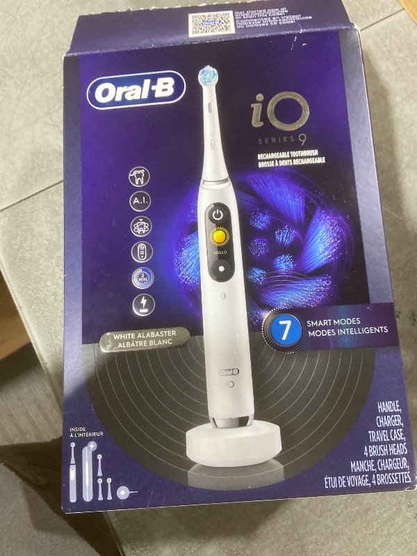 Photo 1 of Oral-B iO Series 9 Electric Toothbrush with 3 Replacement Brush Heads, White Alabaster