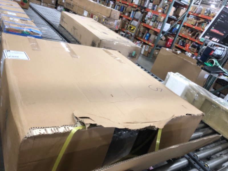 Photo 1 of Medline Premium Ultra-Lightweight Wheelchair with Flip-Back Desk Arms and Elevating Leg Rests for Extra Comfort, Black, 22” x 18" Seat