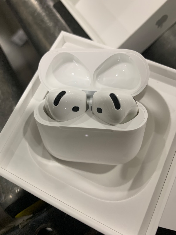 Photo 1 of Apple AirPods 4 Wireless Earbuds, Bluetooth Headphones, with Active Noise Cancellation, Adaptive, Transparency Mode, Personalized Spatial Audio, USB-C Charging Case, Wireless Charging, H2 Chip