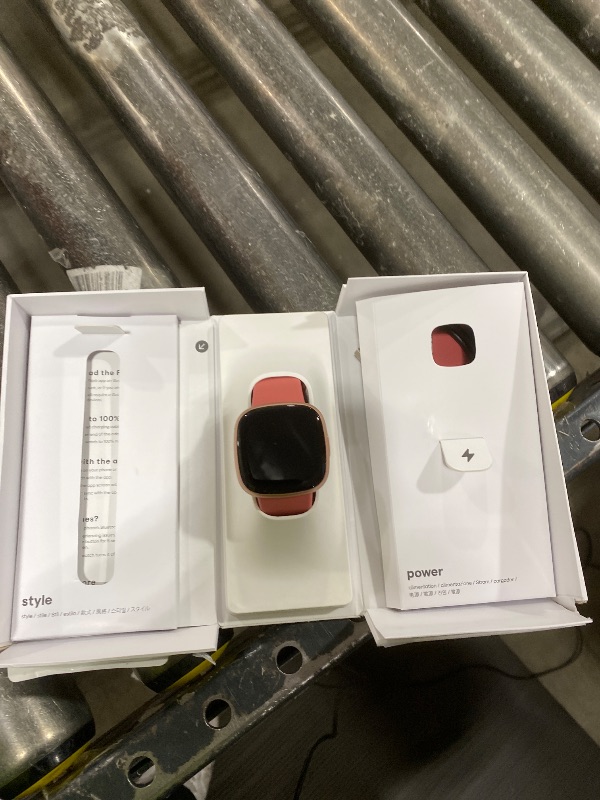 Photo 1 of Fitbit Versa 4 Fitness Smartwatch with Daily Readiness, GPS, 24/7 Heart Rate, 40+ Exercise Modes, Sleep Tracking and more, Pink Sand/Copper Rose, One Size (S & L Bands Included)