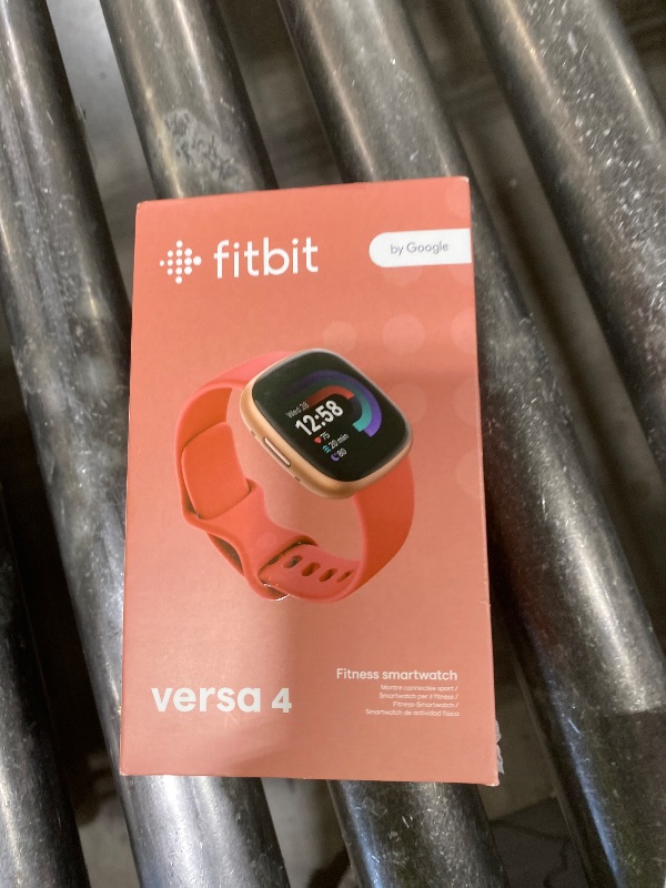 Photo 1 of Fitbit Versa 4 Fitness Smartwatch with Daily Readiness, GPS, 24/7 Heart Rate, 40+ Exercise Modes, Sleep Tracking and more, Pink Sand/Copper Rose, One Size (S & L Bands Included)