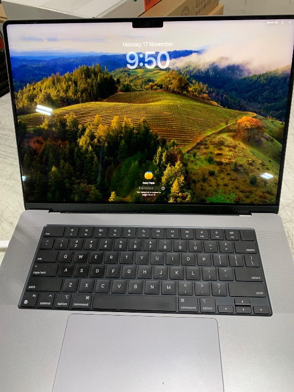 Photo 1 of Apple MacBook Pro Late 2021 with Apple M1 Pro chip (16-inch, 16GB RAM, 512GB SSD) Space Gray (Renewed)