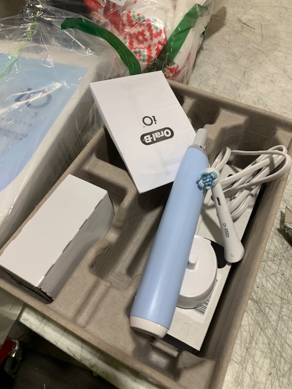 Photo 3 of Oral-B iO Deep Clean Rechargeable Electric Powered Toothbrush, Icy Blue with iO Series 3 Limited, 2 Brush Heads and Travel Case - Pressure Sensor to Protect Gums - 3 Cleaning Settings - 2 Minute Timer