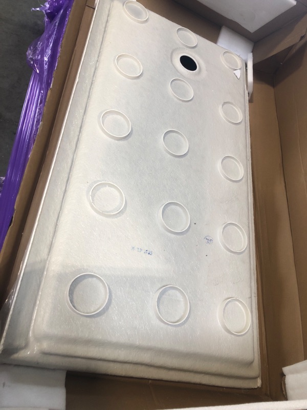 Photo 1 of **** SOME OF THE EDGES ARE BROKEN, PLEASE SEE PICTURES****
DreamLine SlimLine 32 in. D x 60 in. W x 2 3/4 in. H Right Drain Single Threshold Shower Base in White, DLT-1132602