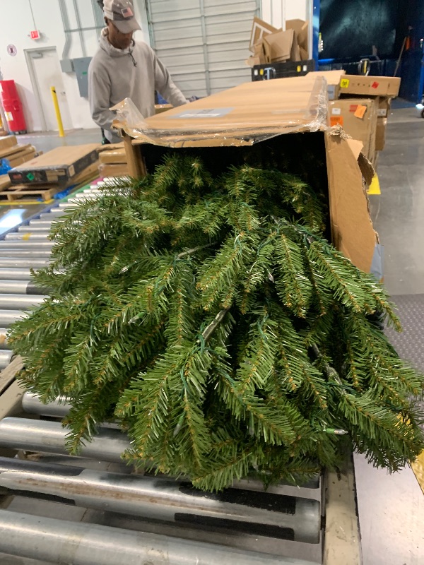 Photo 1 of ***UPDATED 5/3*** National Tree Company 7.5 ft Pre-Lit Dunhill Fir Artificial Christmas Tree, 700 LED Lights, 2,514 Tips, Foot Pedal, 10 Light Functions, Includes Stand, Green