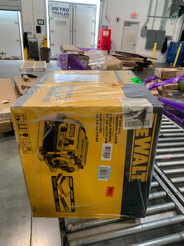 Photo 1 of **FACTORY SEAL**
DEWALT Thickness Planer, 13-inch Wood Planer, Three Knife Two Speed, 15 Amp, 20,000 RPM Motor (DW735X)