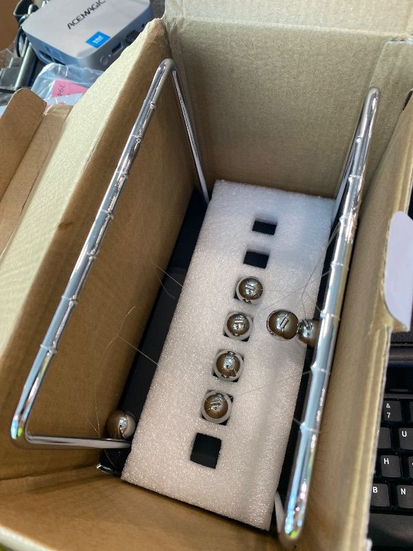 Photo 1 of **MAJOR DAMAGE**
QLKUNLA Newtons Cradle Balance Balls Science Physics Gadget Desktop Decoration Kinetic Motion Toy for Home and Office(7 Beads) (7 Beads)