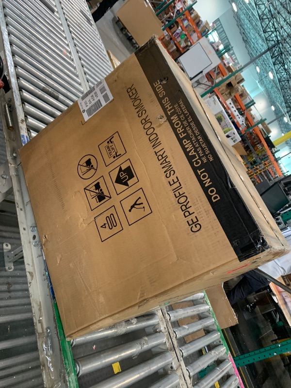 Photo 1 of ** FACTORY SEALED *** GE Profile™ Smart Indoor Pellet Smoker, with Active Smoke Filtration, 5 Smoke Control Settings, WiFi Connected, Electric, Countertop BBQ Appliance, Black