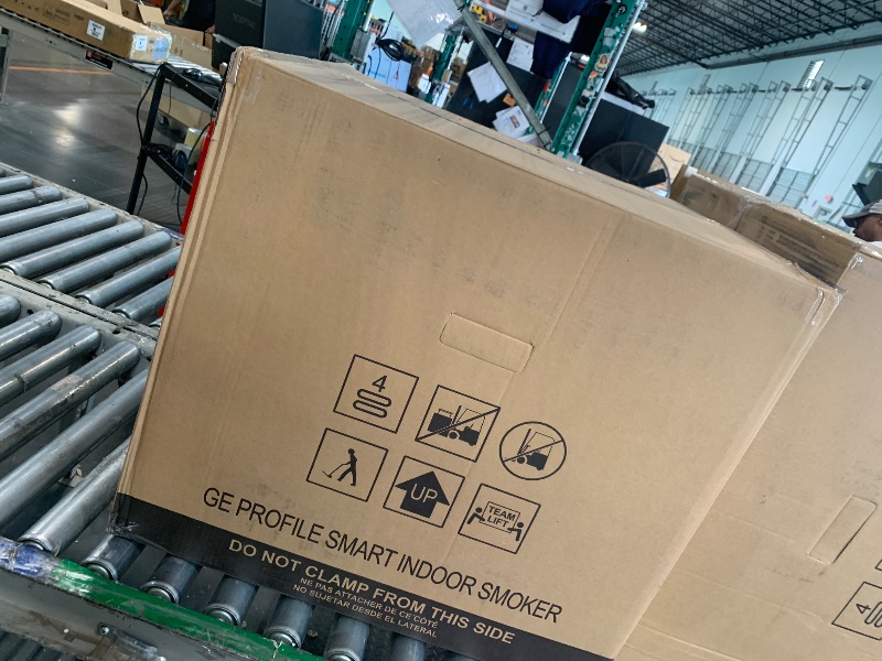 Photo 1 of ** FACTORI SEALED ** GE Profile™ Smart Indoor Pellet Smoker, with Active Smoke Filtration, 5 Smoke Control Settings, WiFi Connected, Electric, Countertop BBQ Appliance, Black
