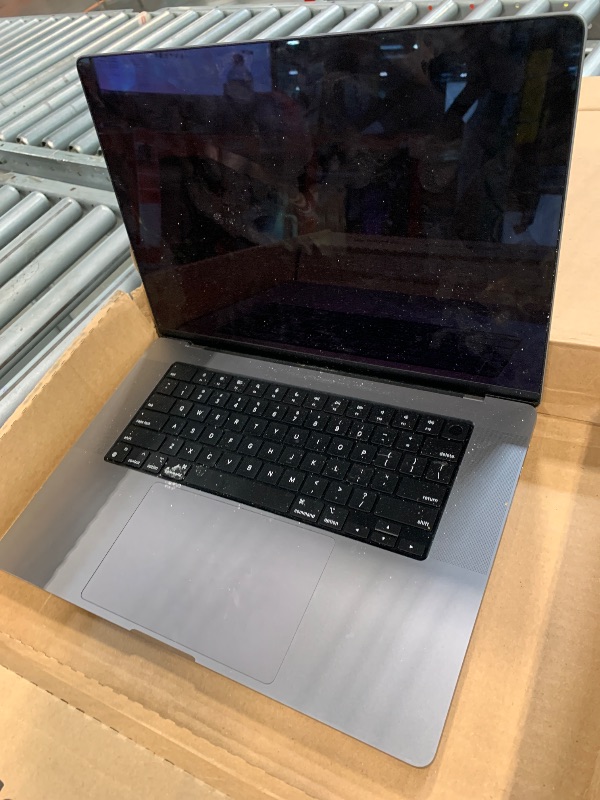 Photo 1 of **need apple support **NOT TESTED** **NO CHARGER INCLUDED** Apple MacBook Pro Late 2021 with Apple M1 Pro chip (16-inch, 16GB RAM, 512GB SSD) Space Gray (Renewed)