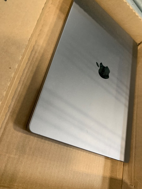 Photo 1 of **need apple support **NOT TESTED** **NO CHARGER INCLUDED** Apple MacBook Pro Late 2021 with Apple M1 Pro chip (16-inch, 16GB RAM, 512GB SSD) Space Gray (Renewed)