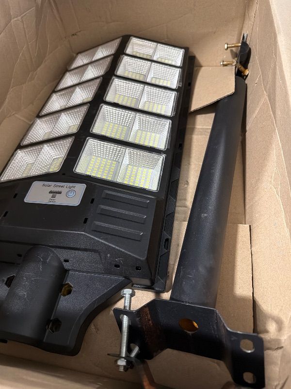 Photo 1 of **DAMAGED**
JOYEYE Solar Street Light 8000W, Street Light Outdoor High Lumens, Parking Lot Lights 6500K, Solar Lights Outdoor Motion Sensor Dusk to Dawn for Parking Lot with Remote Control, 1 Pack
**USED**