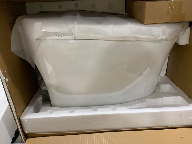 Photo 1 of WOODBRIDGE Smart Toilet, Auto Open & Close, Auto Flush, Foot Sensor Operation, Heated Seat and Integrated Multi Function Remote Control in White