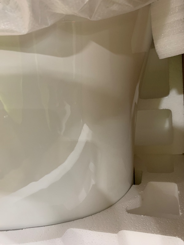 Photo 1 of WOODBRIDGE Smart Toilet, Auto Open & Close, Auto Flush, Foot Sensor Operation, Heated Seat and Integrated Multi Function Remote Control in White