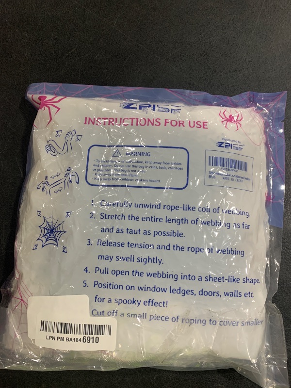 Photo 1 of 1400 sqft Halloween Spider Webs Decorations with 150 Extra Fake Spiders, Super Stretchy Cobwebs for Halloween Decor Indoor and Outdoor