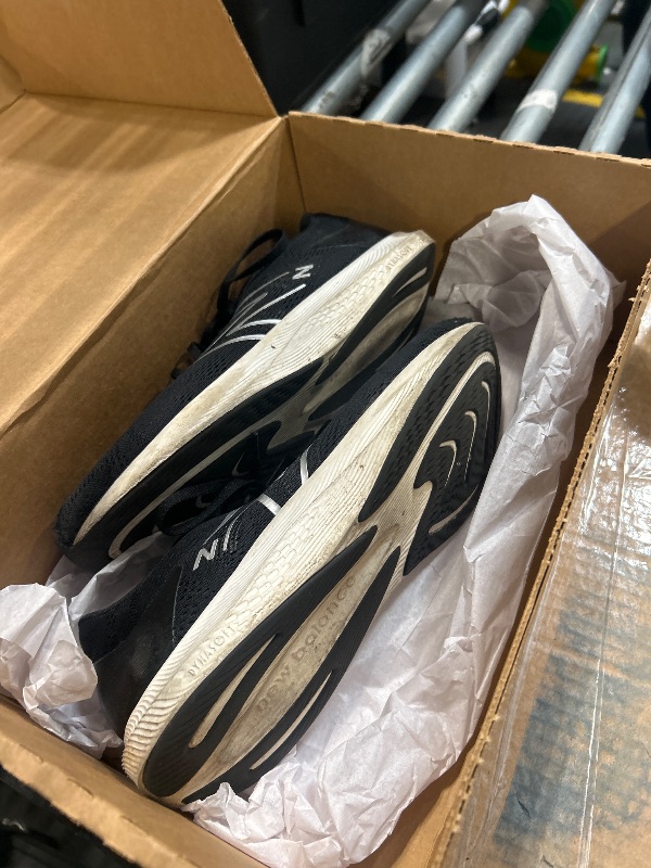 Photo 1 of ****VERY USED***
New Balance Men's DynaSoft Pro Run V2 Running Shoe, Black/White/Light Silver Metallic, 11.5 M