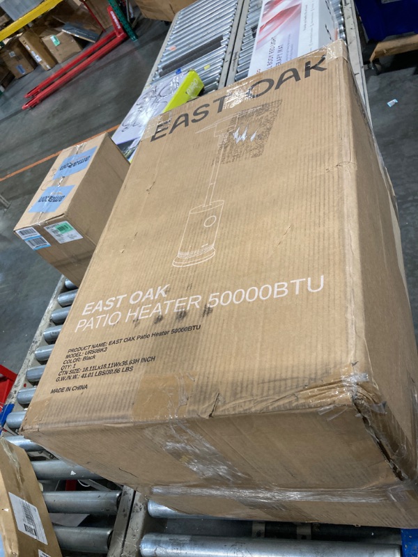 Photo 1 of **** MISSING PARTS FINAL SALE****Amazon Basics 46,000 BTU Outdoor Propane Patio Heater with Wheels, Commercial & Residential, Havana Bronze, with Water Tank, 32.1 x 32.1 x 91.3 inches (LxWxH)