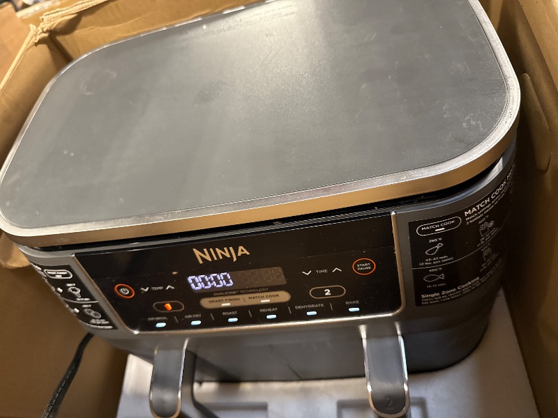 View 3 of *MINOR DAMAGE - USED*
Ninja DZ201 Foodi 8 Quart 6-in-1 DualZone 2-Basket Air Fryer with 2 Independent Frying Baskets, Match Cook & Smart Finish to Roast, Broil, Dehydrate & More for Quick, Easy Meals, Grey