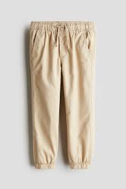 Photo 1 of **SIMILAR NOT EXACT**
BEIGE KIDS (BOY) JOGGERS