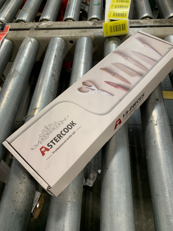 Photo 1 of ***MISSING TWO KNIVES*** Astercook Knife Set, 13 Pieces Kitchen Knives Set with Healthy Anti-Rust Coating, Dishwasher Safe, Stainless Steel Chef Knife Sets with 6 Blade Guards, Perfect Holiday Gifts for Kitchen