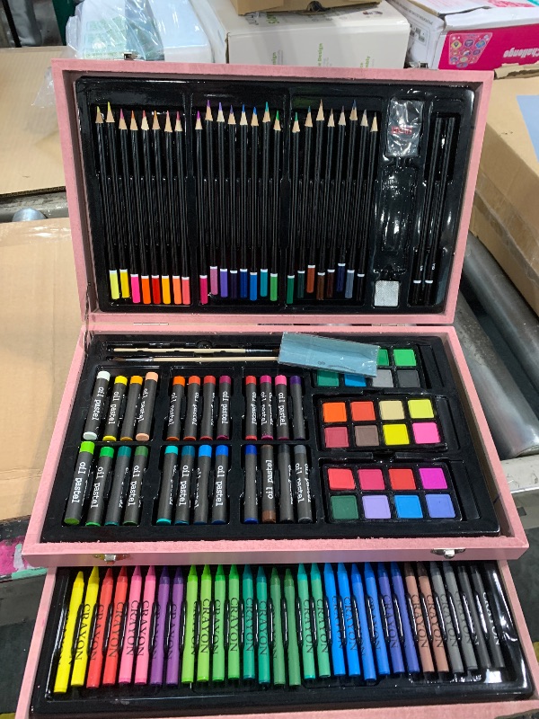 Photo 1 of ***The box is complete the outside has a small damage ****Caliart Art Supplies, 153-Pack Deluxe Art Set in Wooden Case, Crafts Drawing Painting Kits with 2 A4 Sketch Pads, Coloring Book, Stocking Stuffers Christmas Gifts for Teens Girls Kids Artists