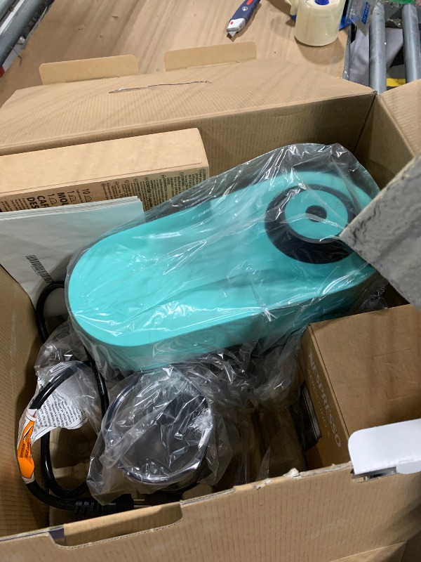 Photo 1 of **MISSING FROTHER**
Nespresso Vertuo Pop+ Coffee and Espresso Maker by Breville with Milk Frother, Aqua Mint