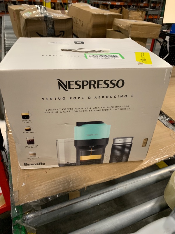 Photo 1 of **MISSING FROTHER**
Nespresso Vertuo Pop+ Coffee and Espresso Maker by Breville with Milk Frother, Aqua Mint